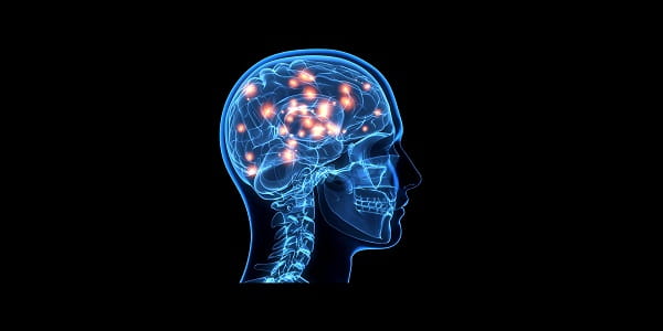 A side profile of a computer generated brain representing the mind and red lights showing the connections the brain makes. 